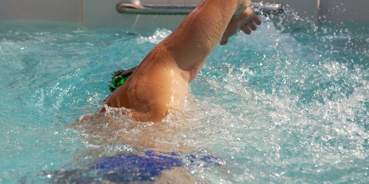 View,Of,Man,Swimming,Crawl,Against,The,Tide,In,A View,Of,Man,Swimming,Crawl,Against,The,Tide,In,A