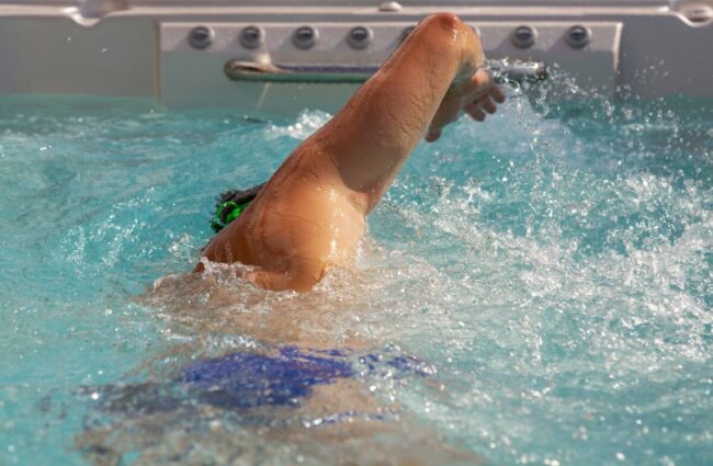 View,Of,Man,Swimming,Crawl,Against,The,Tide,In,A View,Of,Man,Swimming,Crawl,Against,The,Tide,In,A