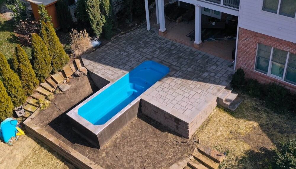 Little Pool Co Relax 6.3 installed above ground Sapphire color birdseye 1000x750