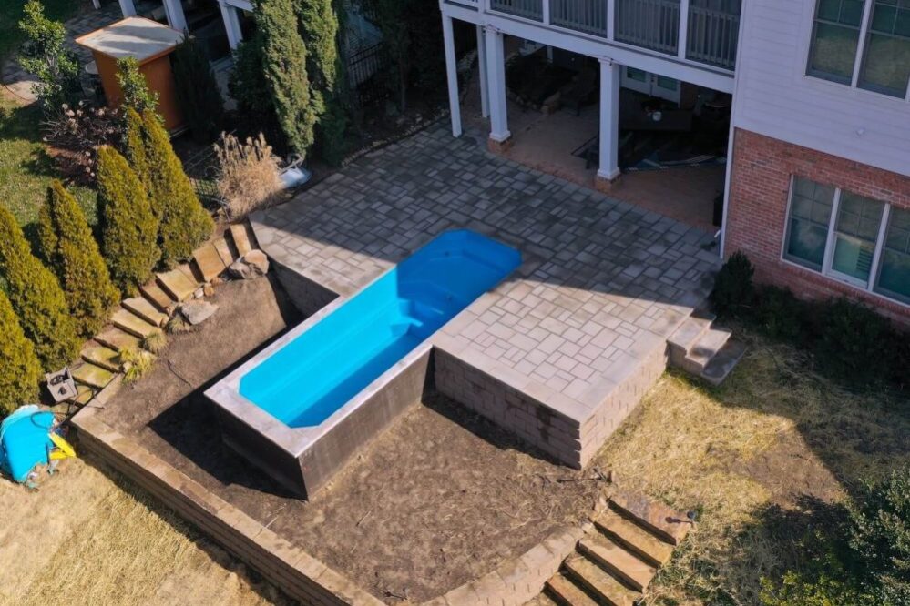 Little Pool Co Relax 6.3 installed above ground Sapphire color birdseye 1000x750