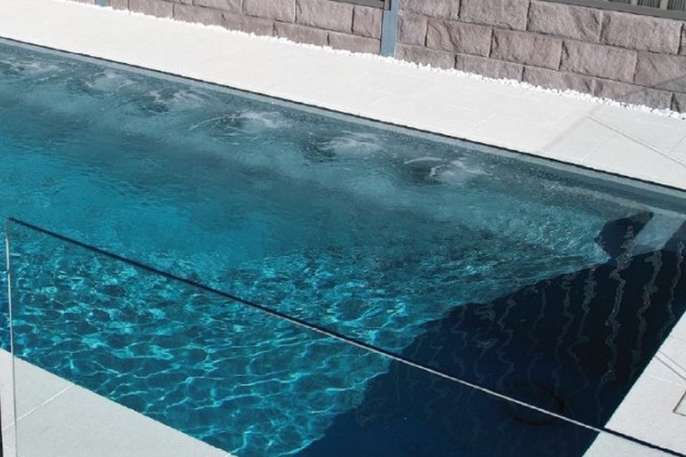 The Little Pool Co Fiberglass plunge pool installed Evolution pool color